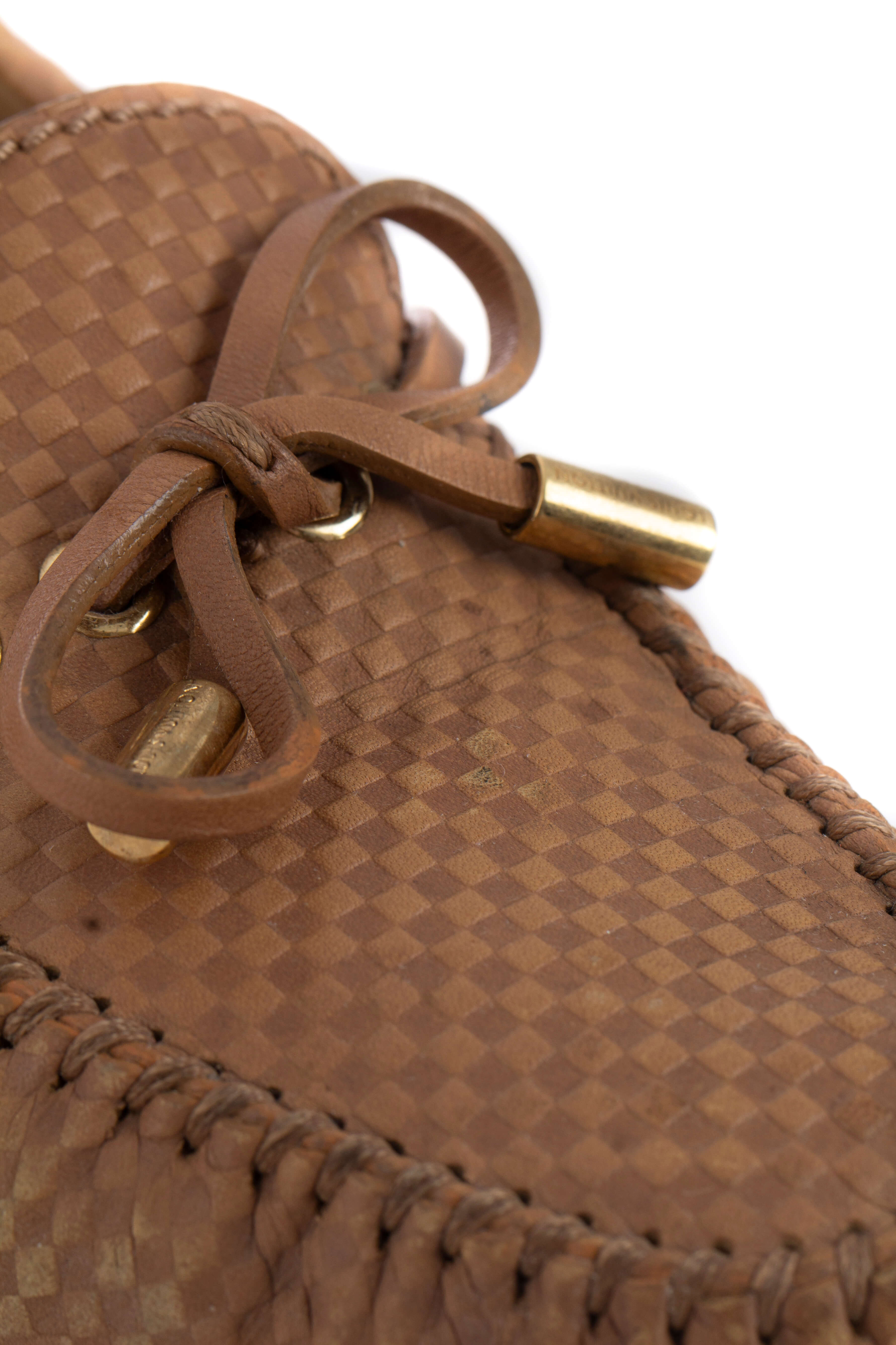 Louis Vuitton, Talla 6