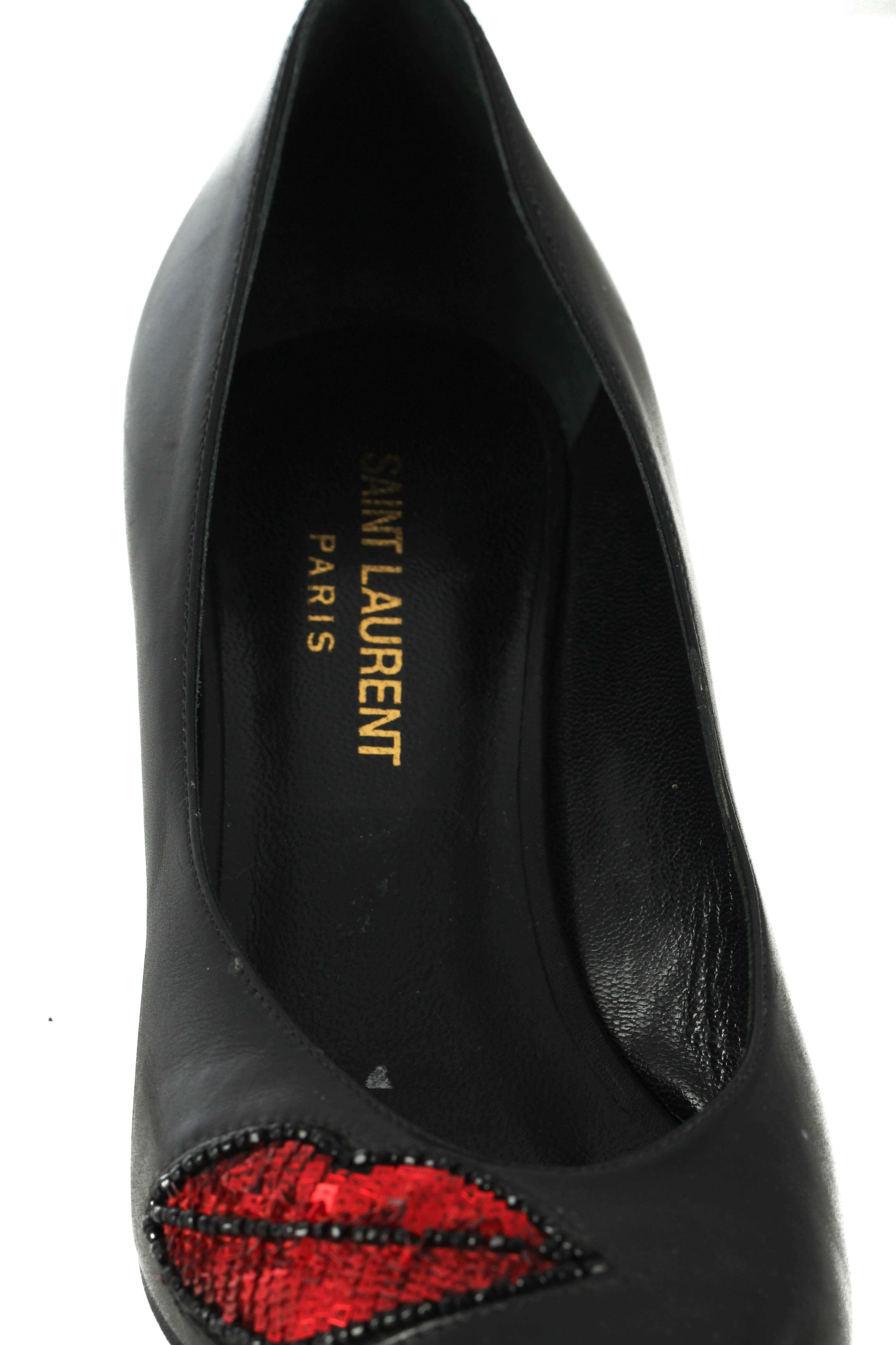 Yves Saint Laurent, 6.5 USA